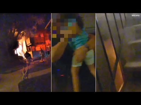 Bodycam video: Police save kids from burning building